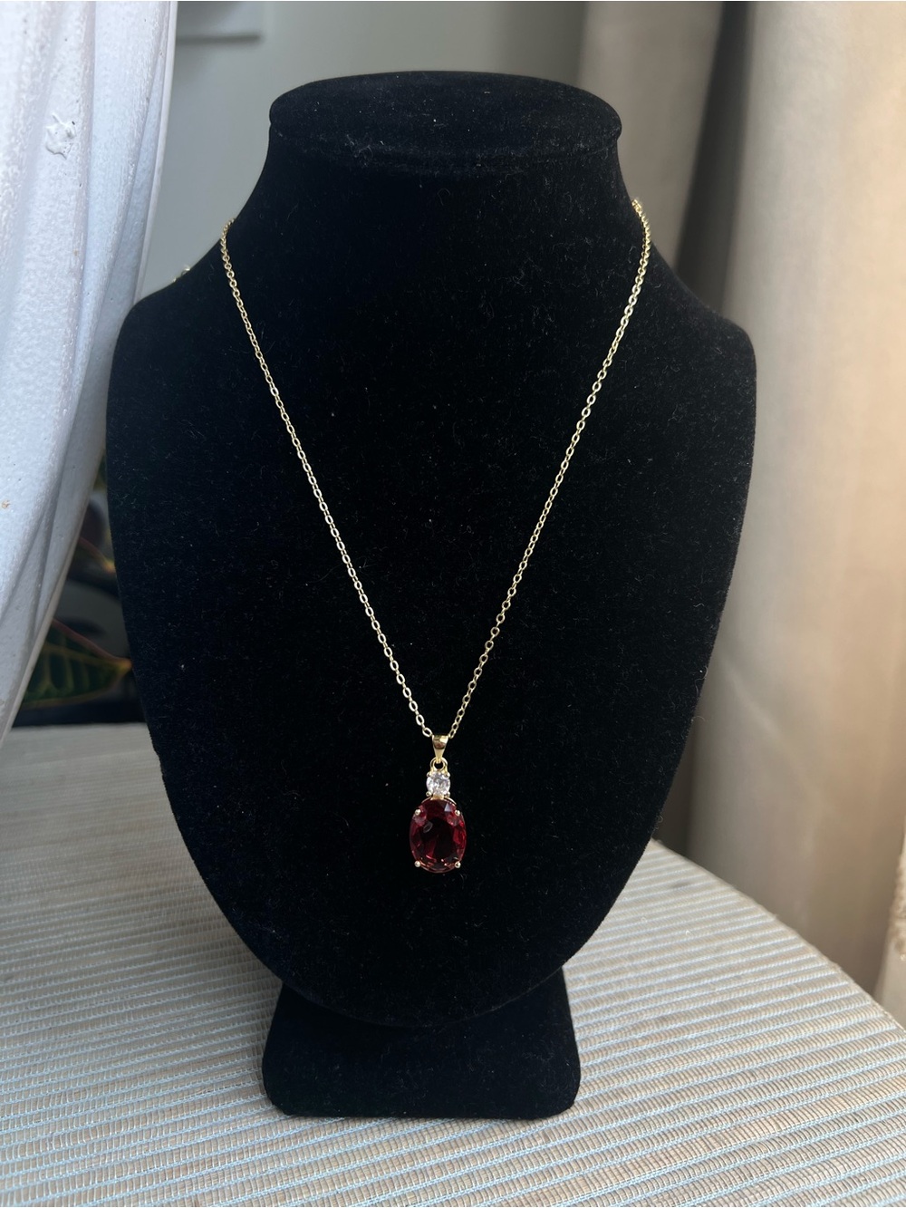 Gold Chain Necklace with Deep Red Oval Pendant with clear stone accent
